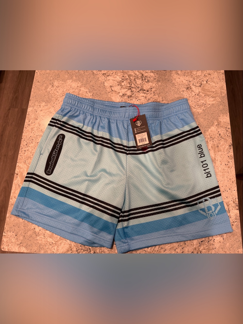 Light Blue Athletic Mesh Shorts with Stripe Accents